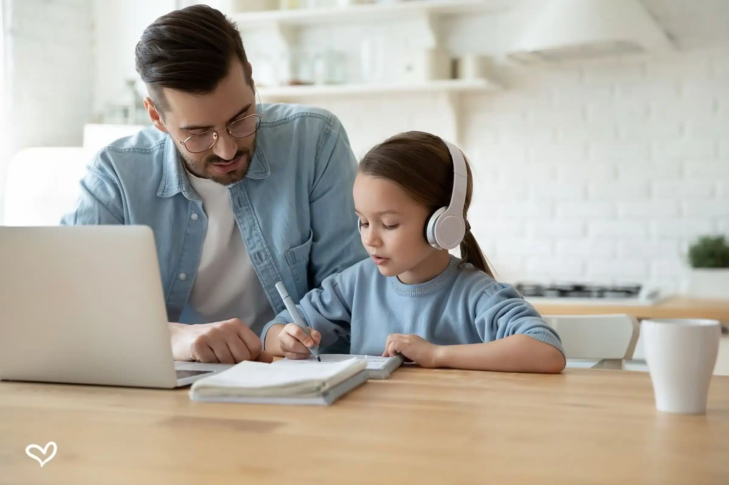 A Matching Minds tutor working one-on-one with a student on digital literacy