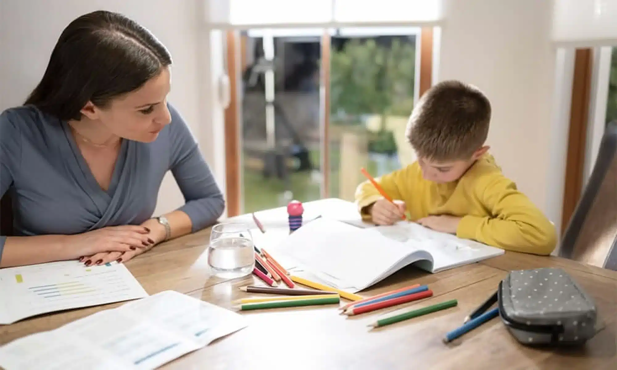 A Matching Minds tutor working one-on-one with a student on writing