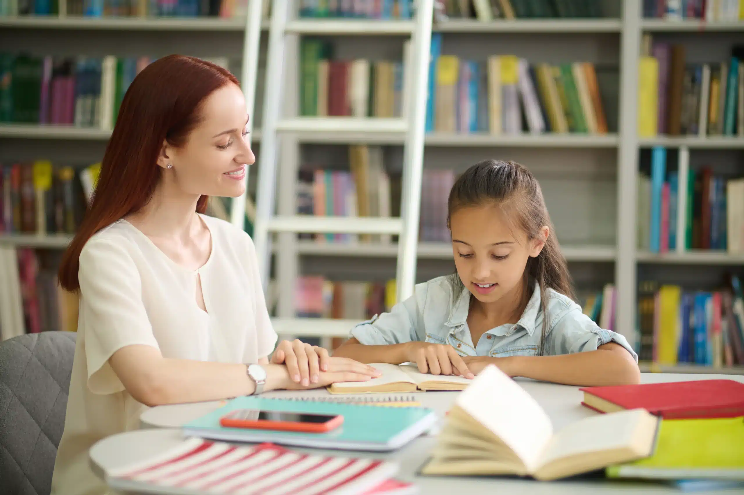 A Matching Minds tutor working one-on-one with a primary school student